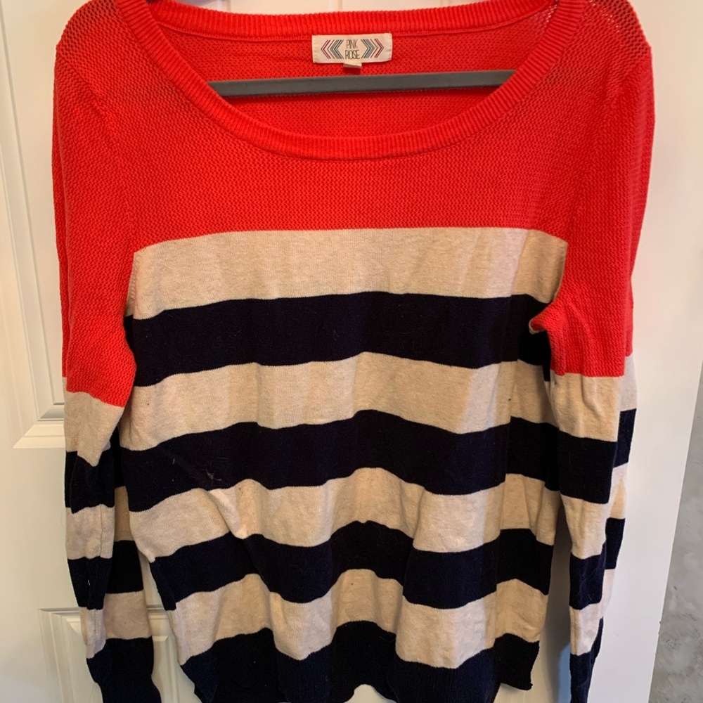 Red, white and blue sweater